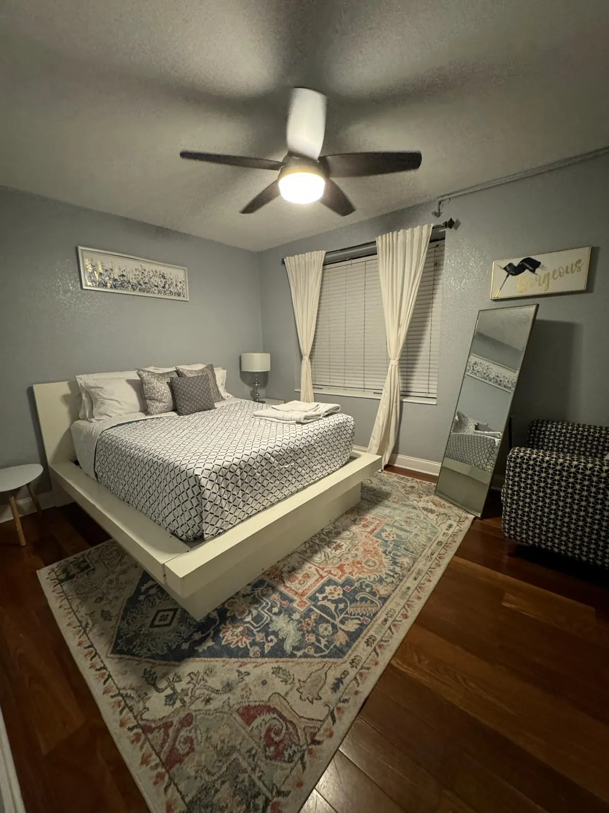 Bedroom prepared with fresh linens — real LOOM cleaning work